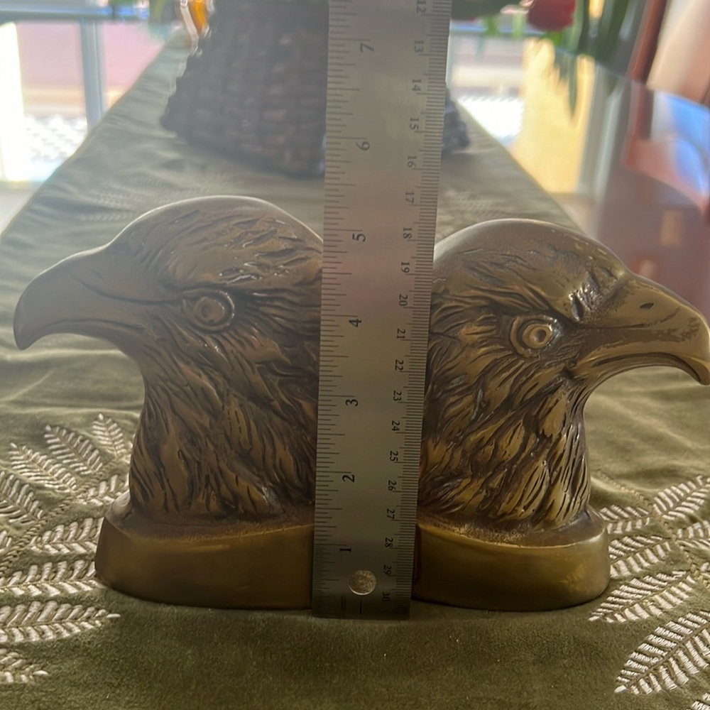 Brass Eaglehead bookends or doorstops.